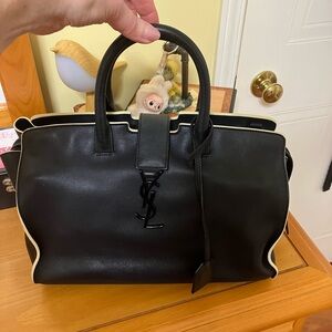 Yves Saint Laurent Black and Cream Satchel
Down Town bag.